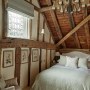 The New Forest Barn  | Mezzanine Bedroom | Interior Designers